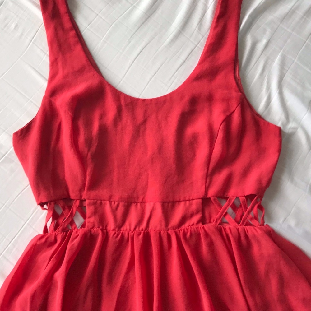 Cute pink dress with cut out sides